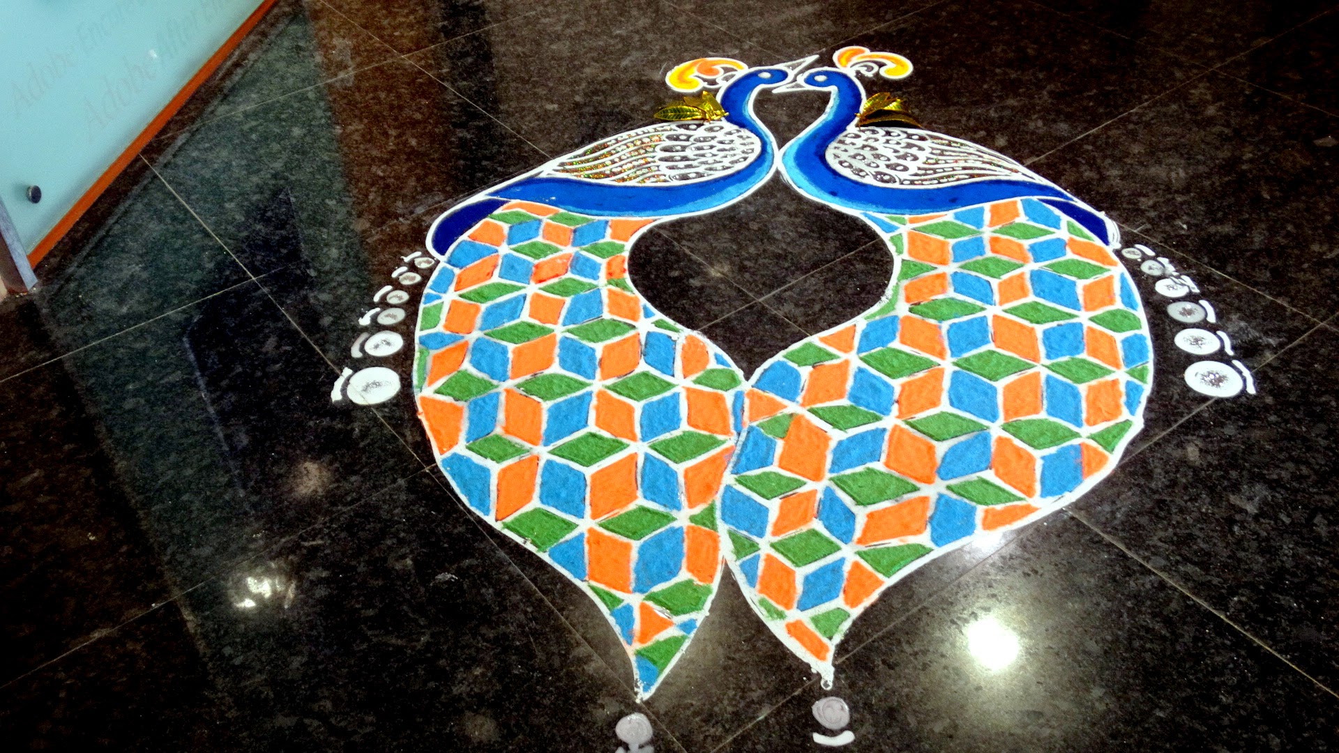 Rangoli is a traditional decorative folk art of India. And the importance of these designs are different in different states of the country. In fact, Rangoli designs are made in different states of India during different occasions & festivals. These are decorative designs made on floors of living rooms and courtyards during Hindu festivals and are meant as sacred welcoming areas for the Hindu deities. The ancient symbols have been passed on through the ages, from each generation to the one that followed, thus keeping both the art form and the tradition alive.