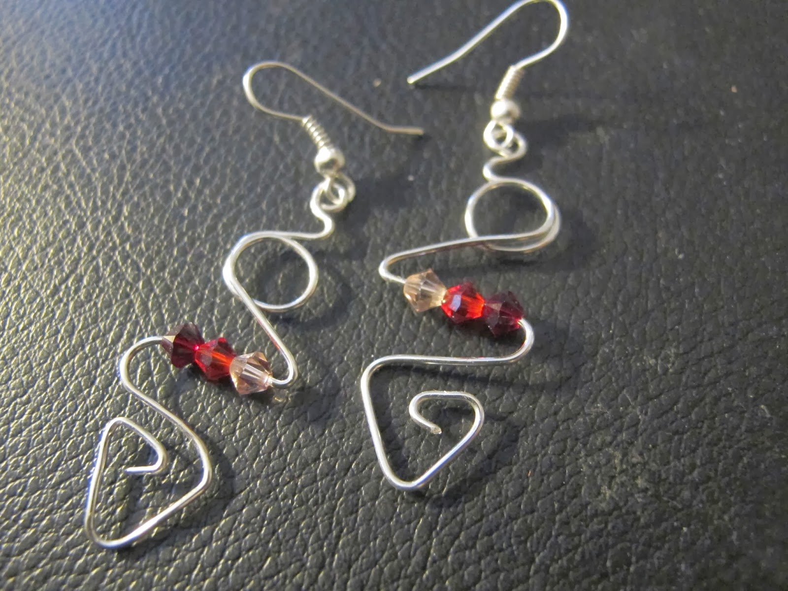 Naomi's Designs Handmade Wire Jewelry Yet more silver wire wrapped earring designs with