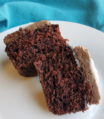 These cupcakes are super simple to make, if you have a whisk and a mixing bowl you can do it! They are also soft, chocolaty and devilishly good. inside of chocolate cupcake