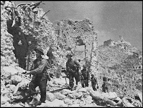 The ruins of Monte Cassino during World War II worldwartwo.filminspector.com