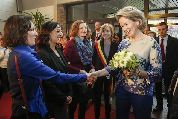 Queen Mathilde of Belgium attend a meeting during a visit to project 'Une etoile, un Destin, style royal weddings royal tiara, diamond, gold earrings