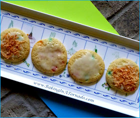 Tropical Storm Cookies: a soft cookie with the hint of a pineapple filled with soft tropical flavored candy, glazed and topped with toasted pineapple | Recipe developed by www.BakingInATornado.com | #recipe #cookies