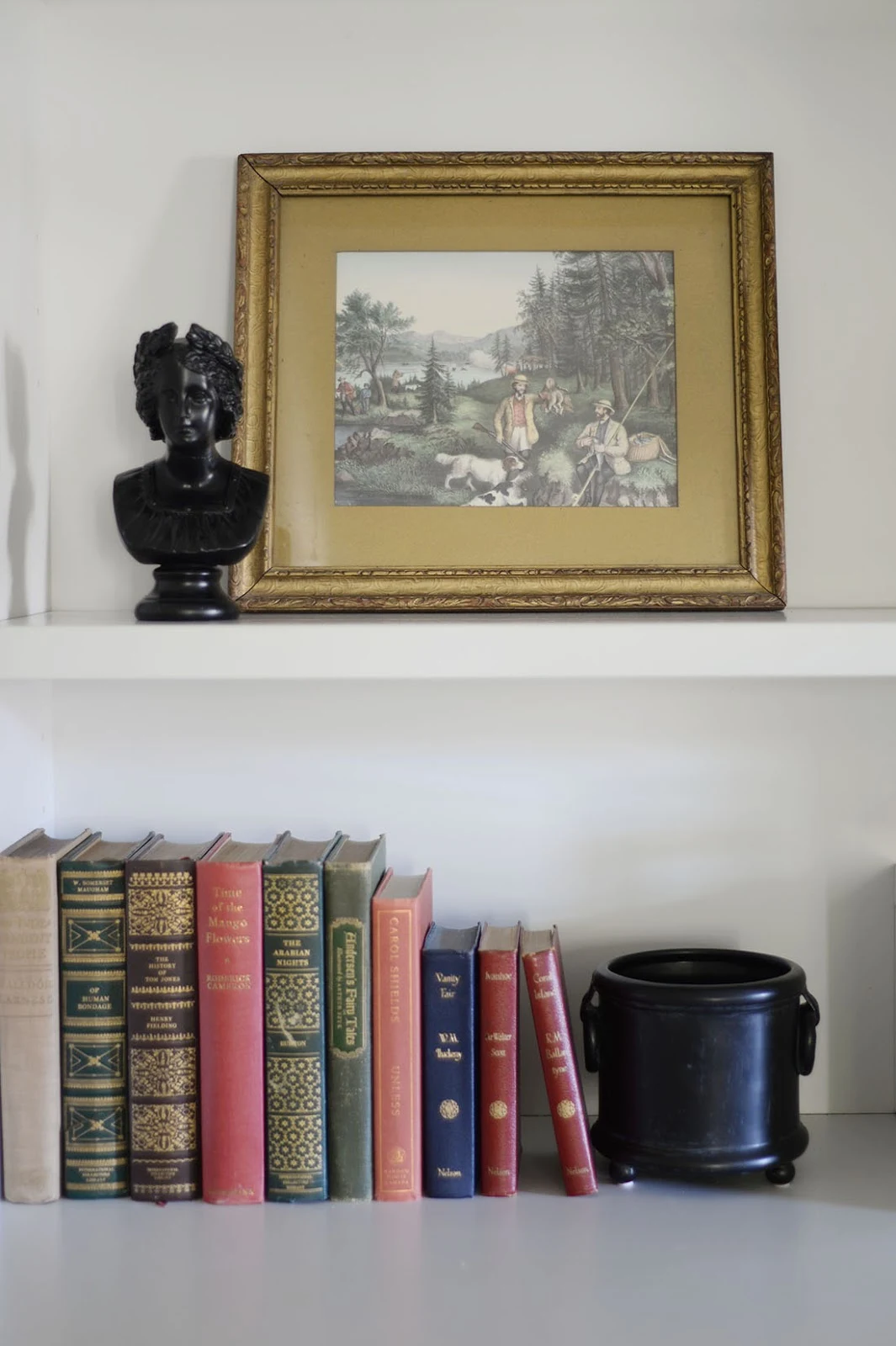 vintage hunting print, vintage books, bookcase styling, miniature bust, fall decor ideas, fall living room