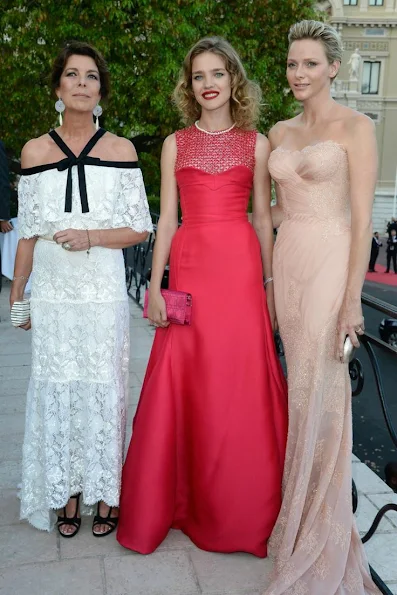 Princess Caroline wore a white lace and black trimmed Chanel Spring 2013 Couture gown Princess Charlene wearing Versace Gown