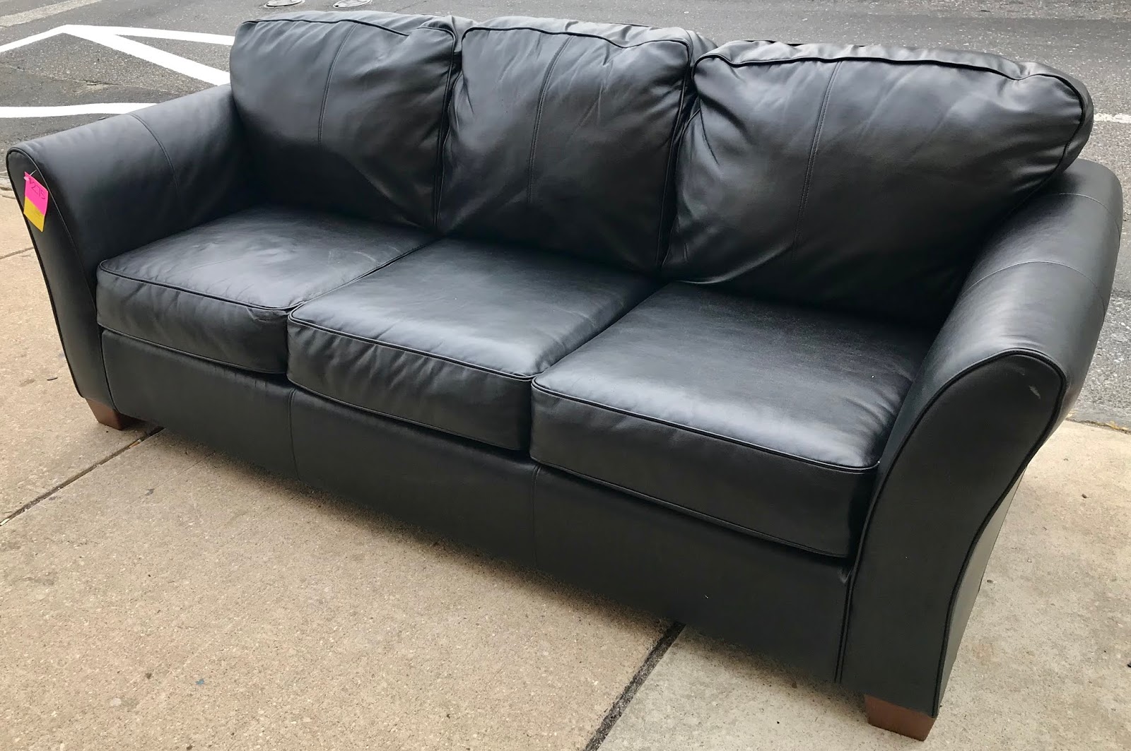 bobs furniture black faux leather sofa