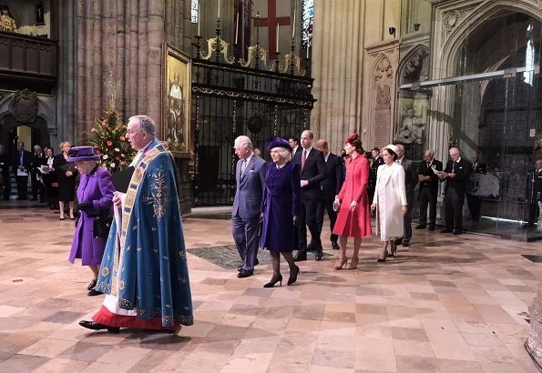 Meghan Markle wore Victoria Beckham printed crepe long sleeve midi dress, Kate Middleton wore a red coat by Catherine Walker