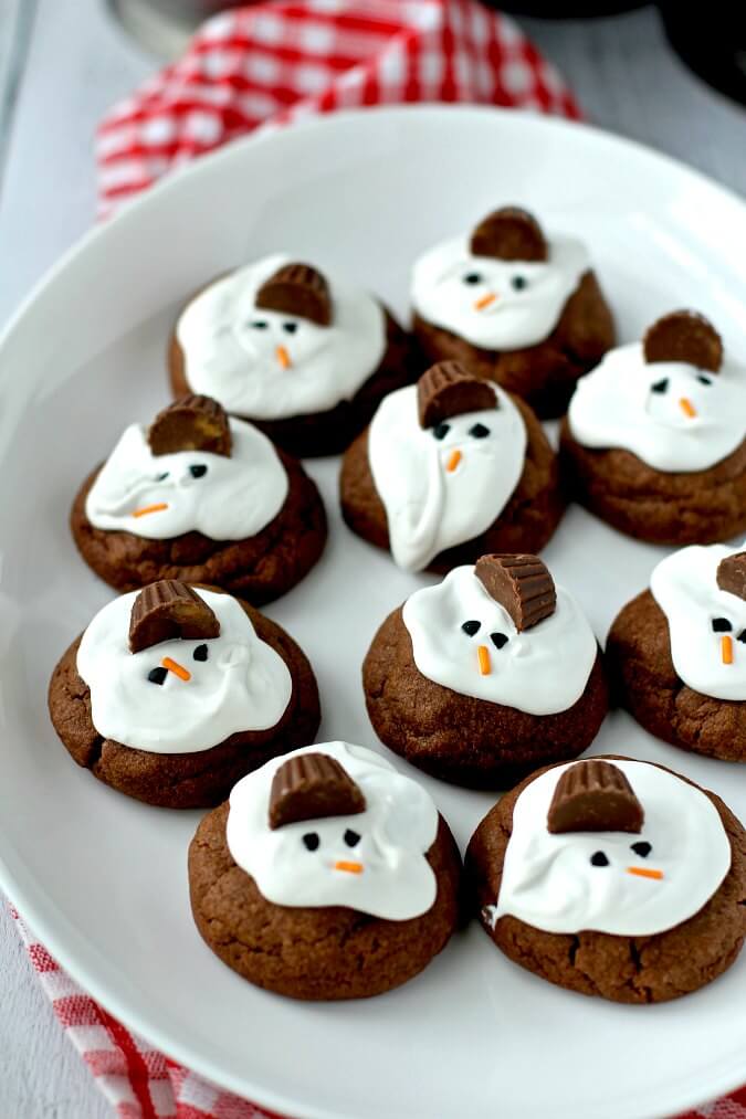 Chocolate and peanut butter Melting Snowman Cookies on a plate Chocolate and peanut butter Melting Snowman Cookies on a plate