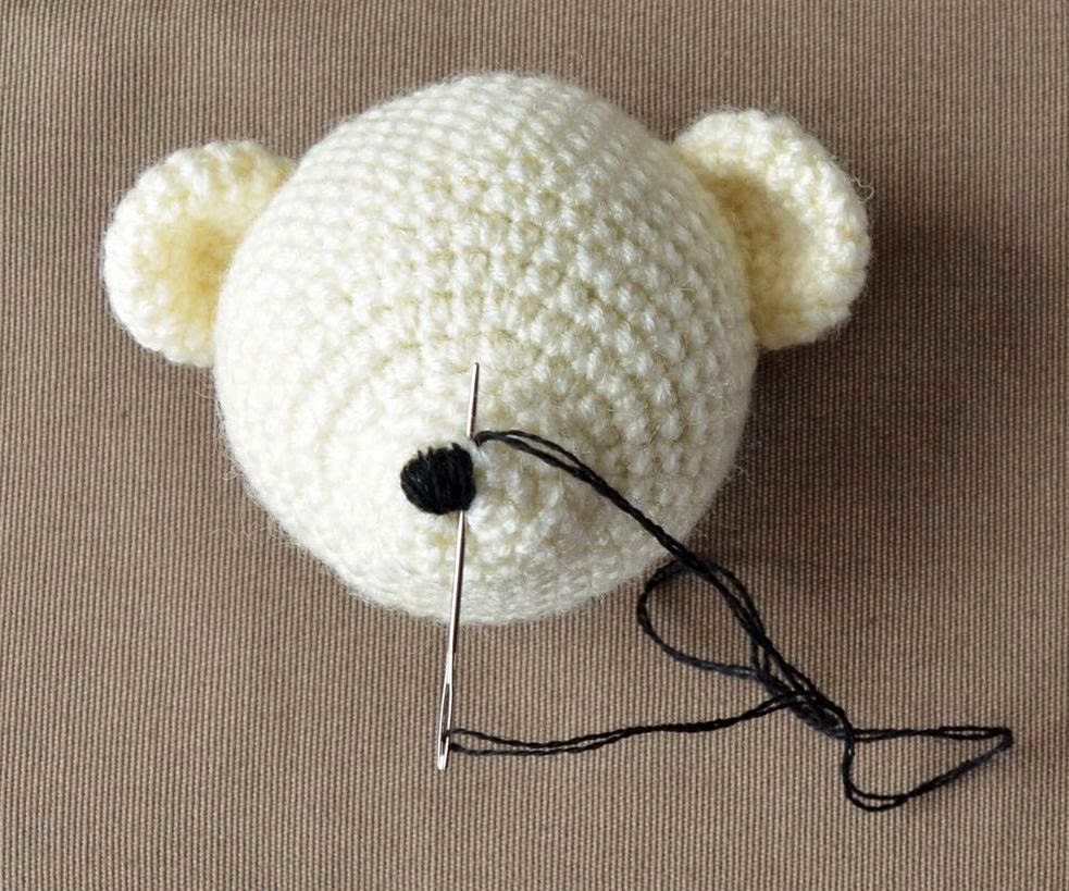 teddy bear with embroidered eyes