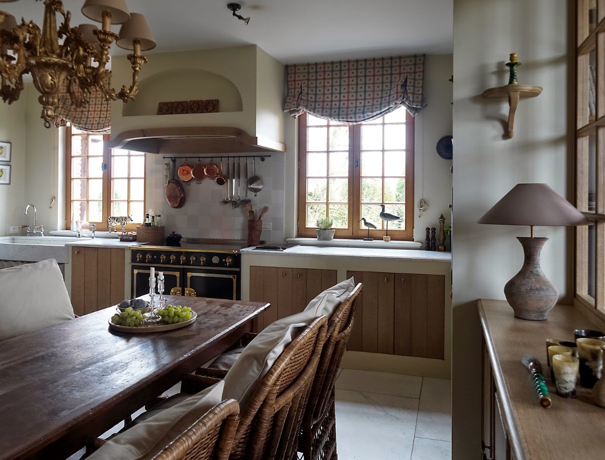 Photo gallery of Greet  Lefèvre's Belgian home with interior design inspiration (photos by Claude Smekens and Belgian Pearls). Fall in love with enchanting gardens and traditional Belgian architecture and sophistication. #belgianinteriors #europeancountry #belgiankitchen