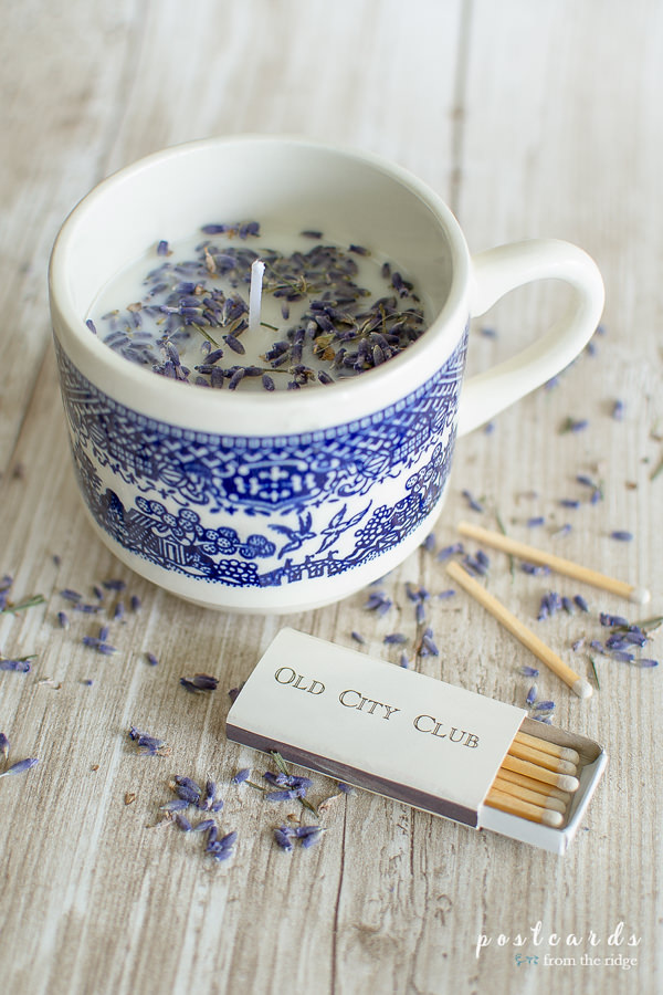 blue and white teacup candle with wooden matches