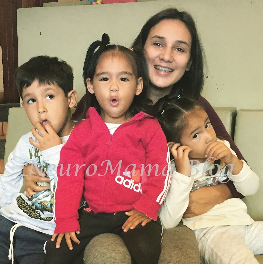 Happy mom with 3 children