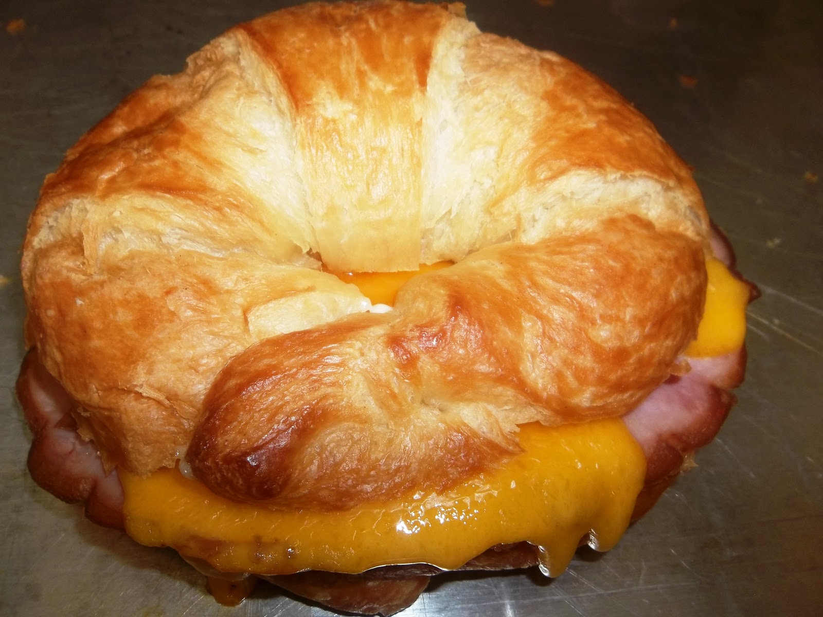 It's All About a Good Recipe Hot Turkey and Cheese on a Croissant
