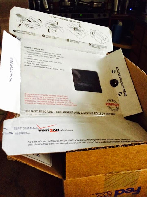 Verizon Packaging The flimsy packaging to be used to return a broken phone. It is nothing but a bit of cardboard and a plastic film over it. You slip the phone between the two. Yeah, that's safe.