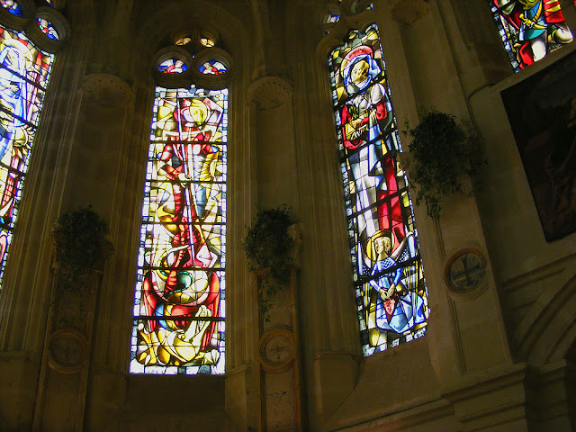 Mid-20C stained glass in the chapel of the Chateau of Chenonceau, Indre et Loire, France. Photo by Loire Valley Time Travel.