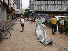 damage from Typhoon Hato at the Lianhua Road Pedestrian Street in Zhuhai, China