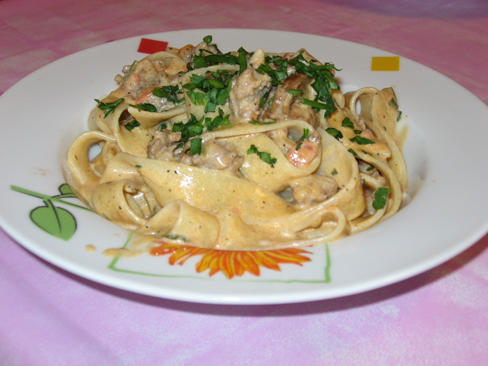 Pappardelle con porcini e salsiccia