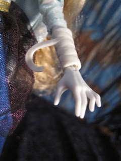Close up of Once Upon a Zombie's Sleeping Beauty's hand with bandages.
