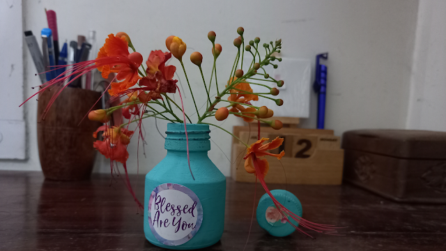 Old ink pot as a flower vase Old ink pot as a flower vase