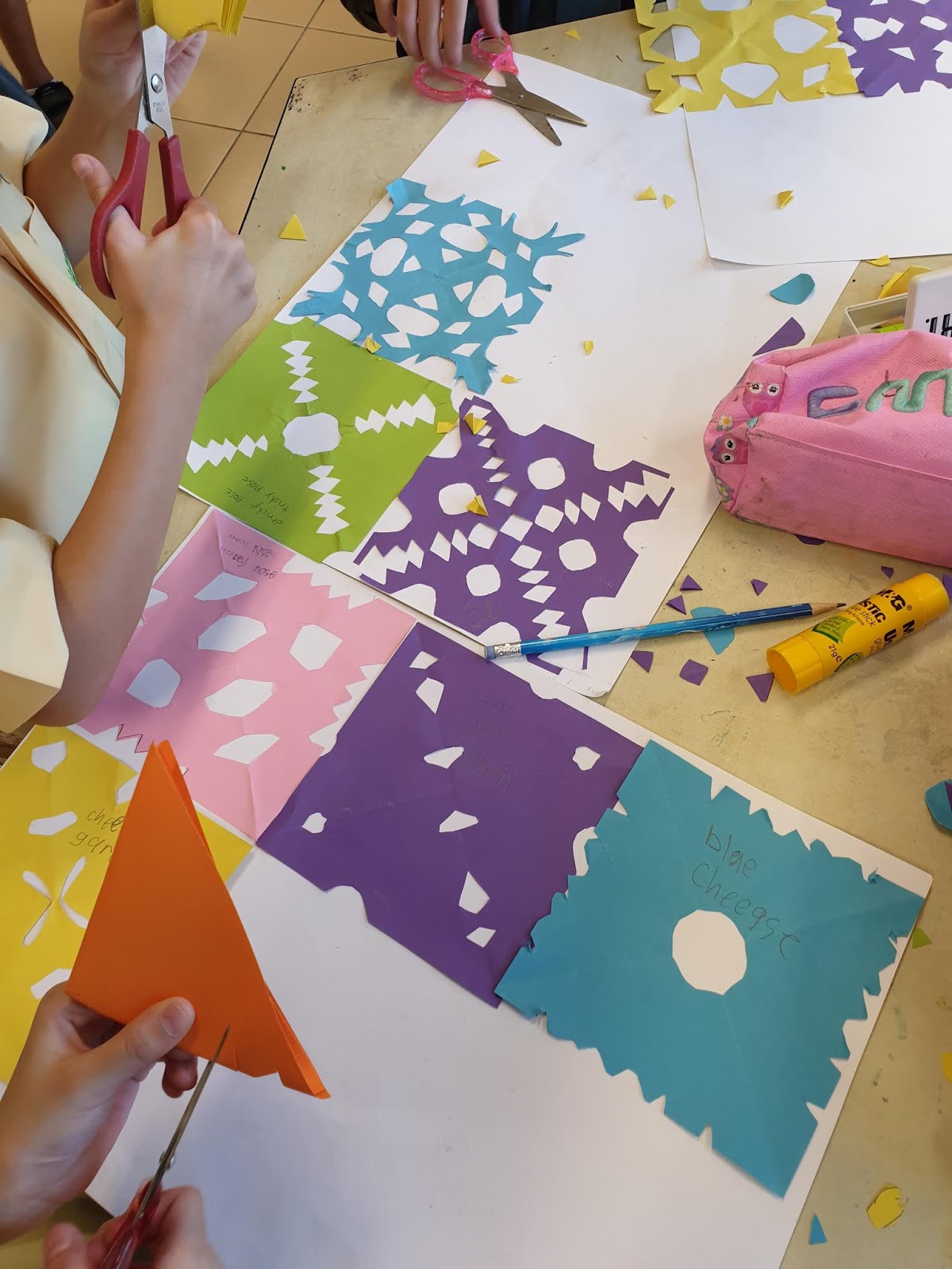 Hazel Huang Art Class Paper cutting and symmetry