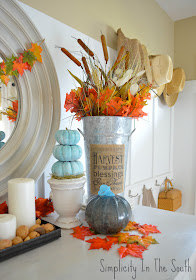 Thanksgiving display and a free fall printable banner. Blown glass pumpkin. Galvanized flower bucket with printed burlap. 