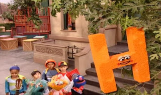 Grover, Zoe and Rosita see an H on the top of a tree. Sesame Street Episode 4071, Professor Super Grover's School for Superheroes