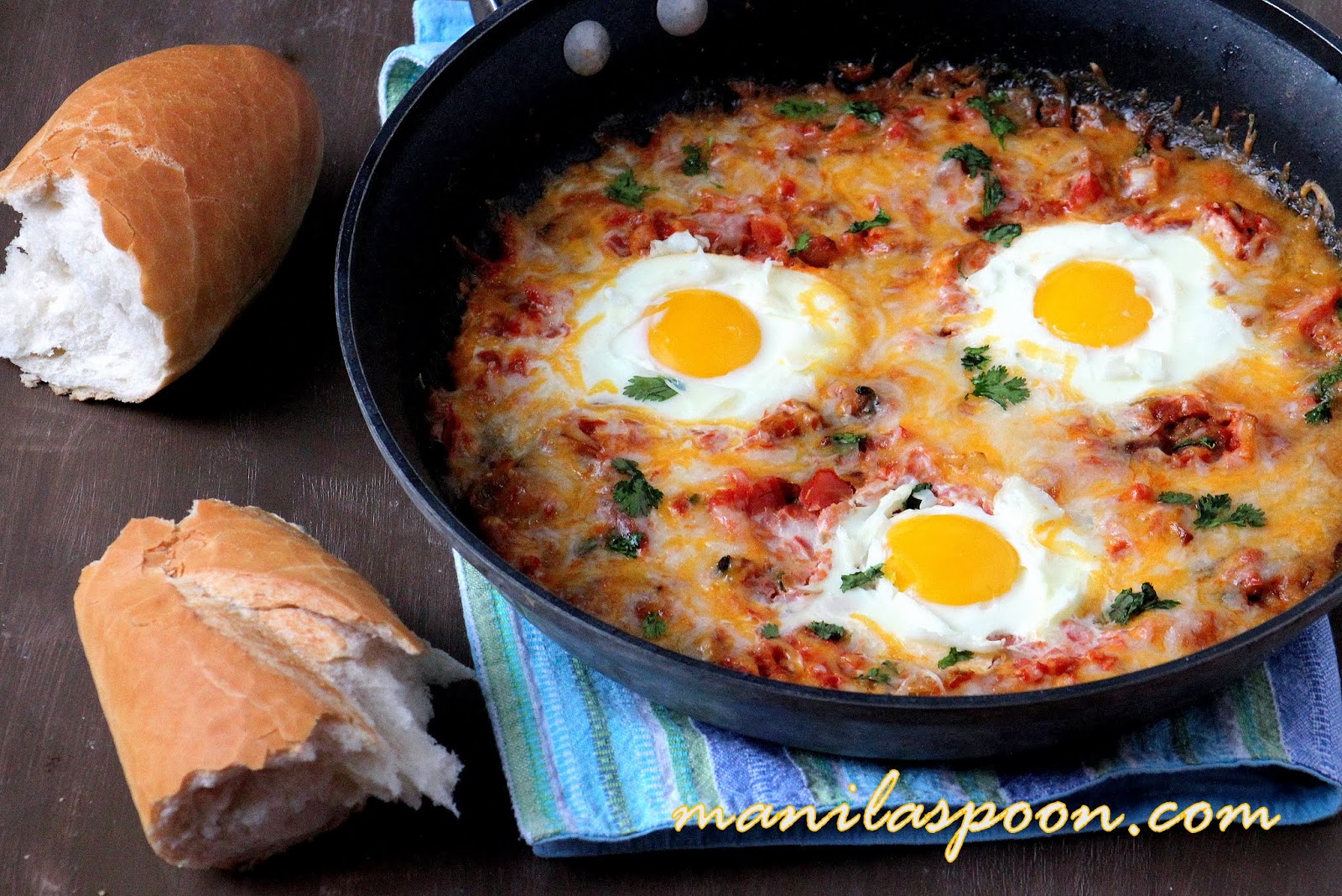 Baked Eggs with Herbs and Tomatoes