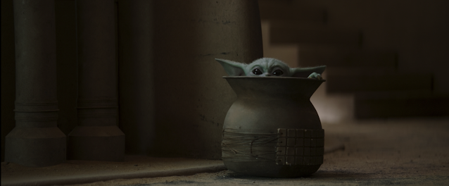 Baby Yoda Peeks Out From Inside A Pot The Mandalorian Season Two Episode One Star Wars