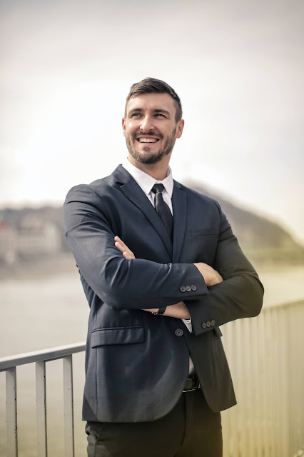 A man standing representing the effects of profound happiness.