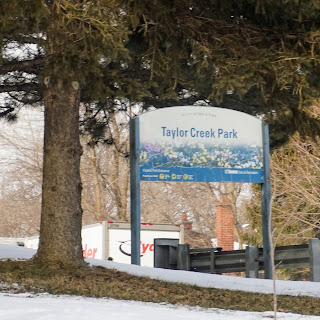 Sign near Victoria Park for Taylor Creek Park in Toronto.