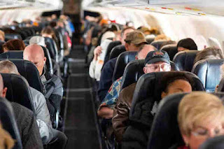 Airlines willing to keep middle seats empty or give ‘wrap-around gowns’