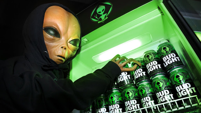"The special-edition aluminum cans feature a green alien and black background as well as a new crest welcoming all extraterrestrials from near and far to crack a cold one..." 