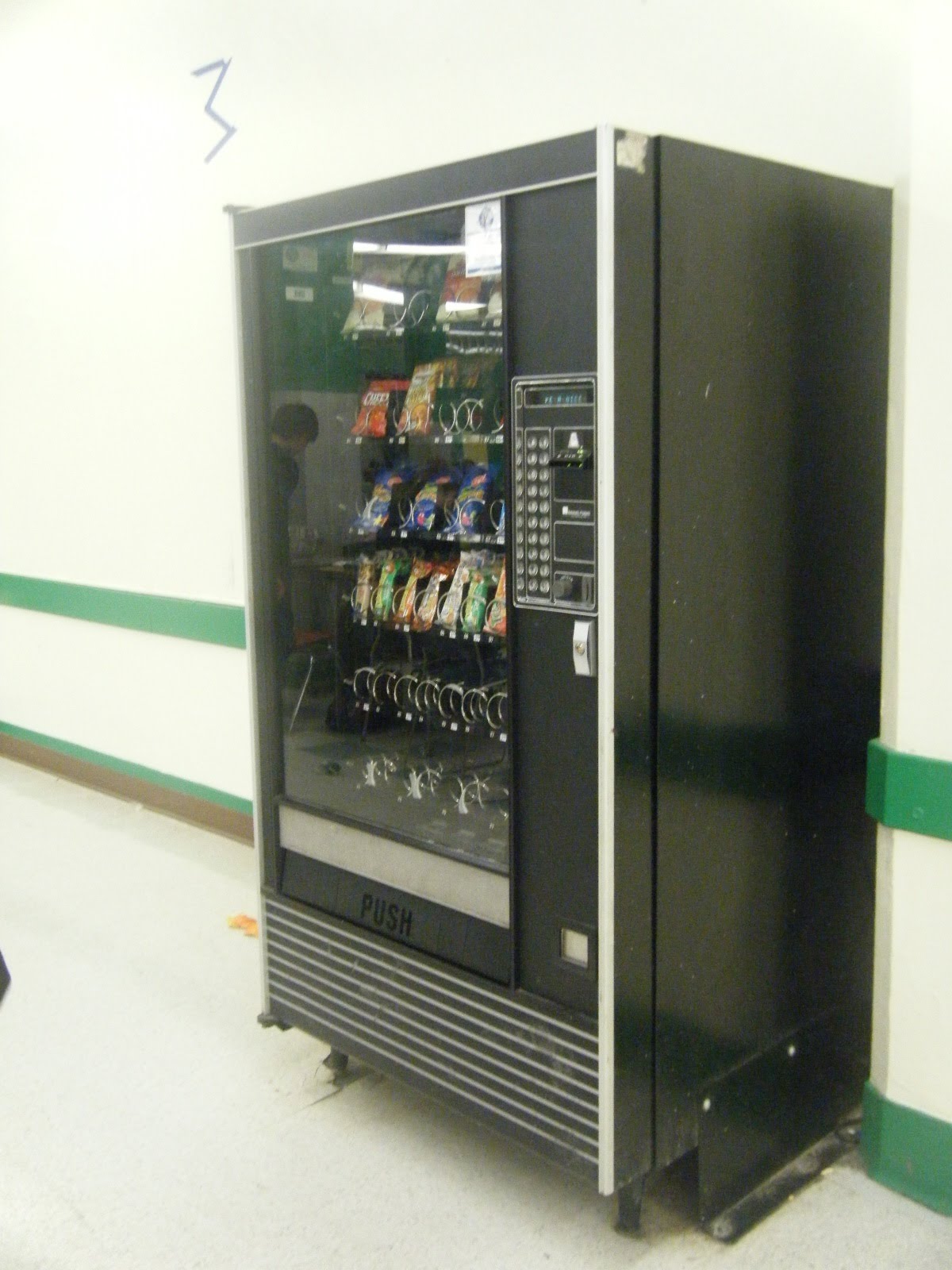 Advertising in cleveland high school vending machine snacks
