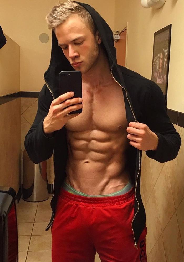 sexy-blond-bad-boy-red-baller-shorts-jock-bro-selfie