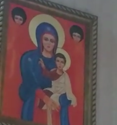 virgin mary lips move on painting during prayer