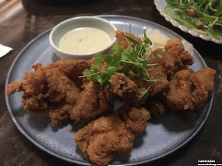 Xinchao fried chicken, pineapple sauce, and pickled bitter gourd