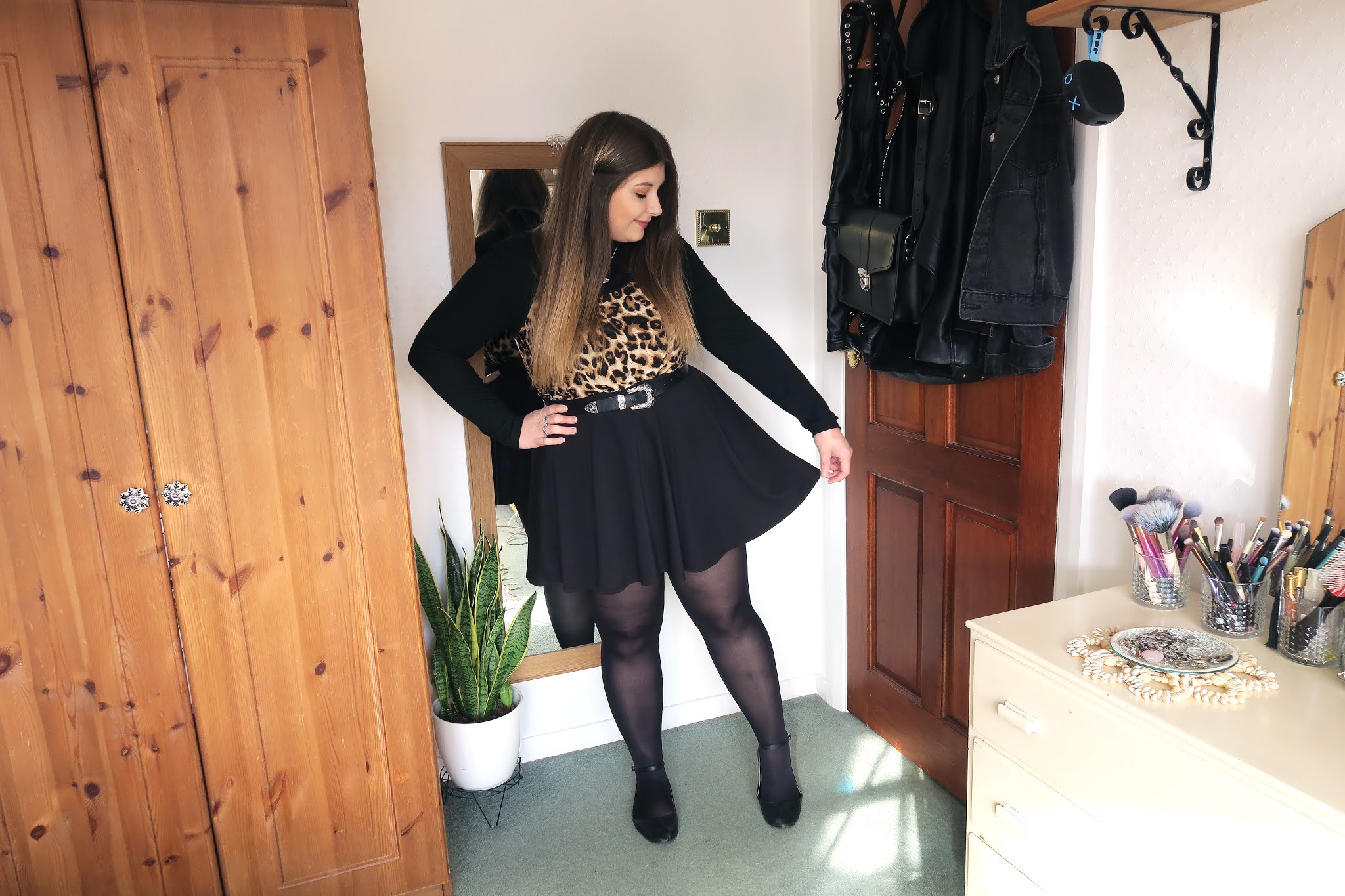 leopard print dress with black top underneath