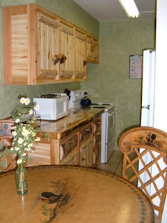 Beautiful rustic log cabinets.  Fully equipped kitchen.