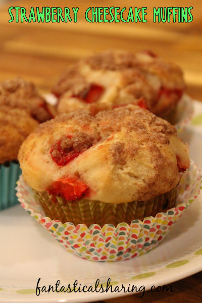 Strawberry Cheesecake Streusel Muffins // These strawberry muffins are layered with smooth cream cheese and cinnamon streusel. #recipe #muffins #breakfast