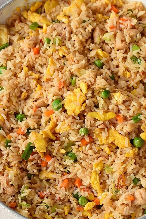 birdseye view of a skillet with chinese chicken fried rice