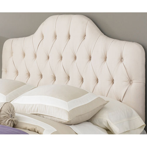 This cream tufted headboard is 60s inspired and looks modern but classic.