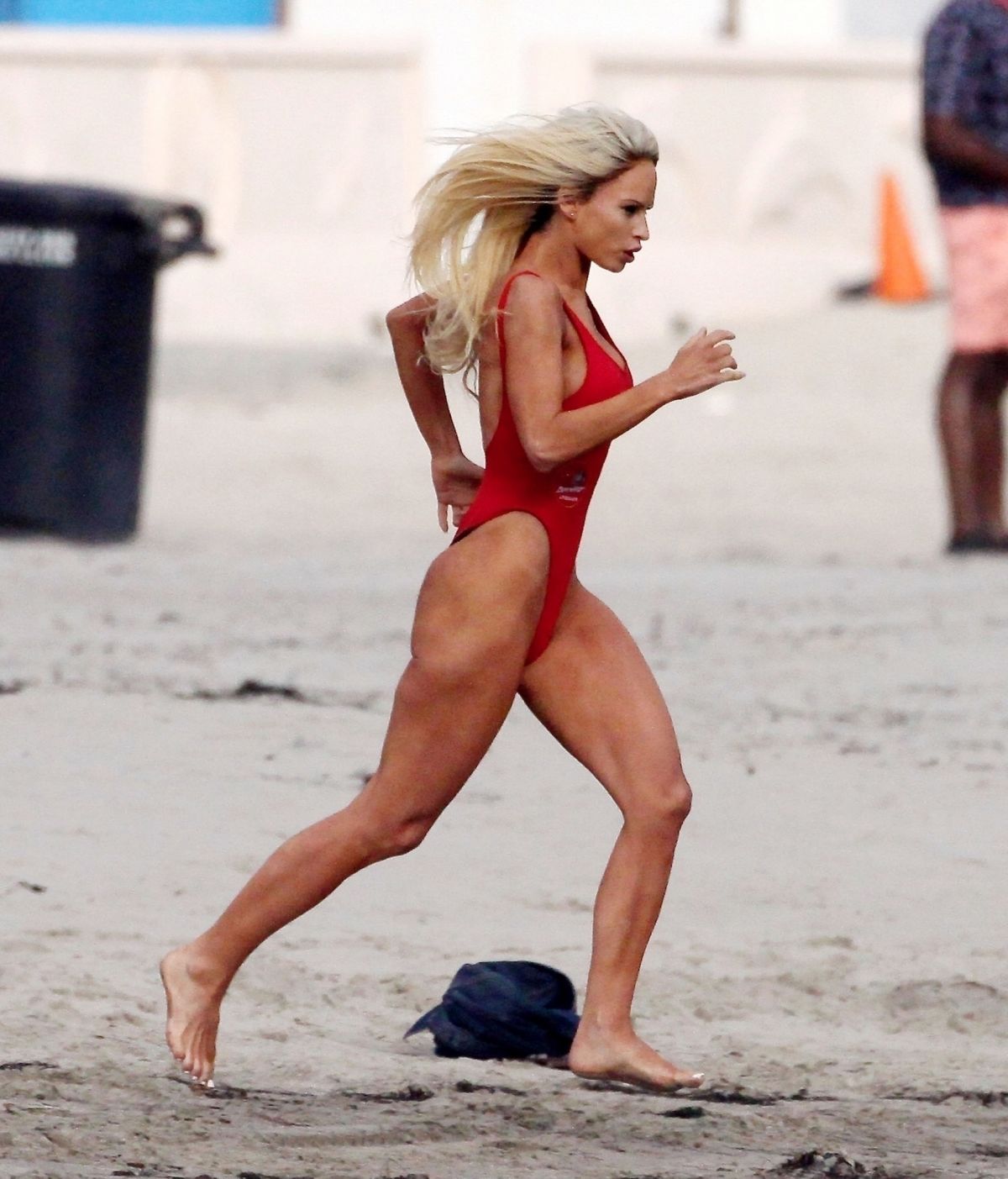 LILY JAMES In Swimsuit As Pam Anderson On The Set Of Pam And Tommy At A Beach In Malibu