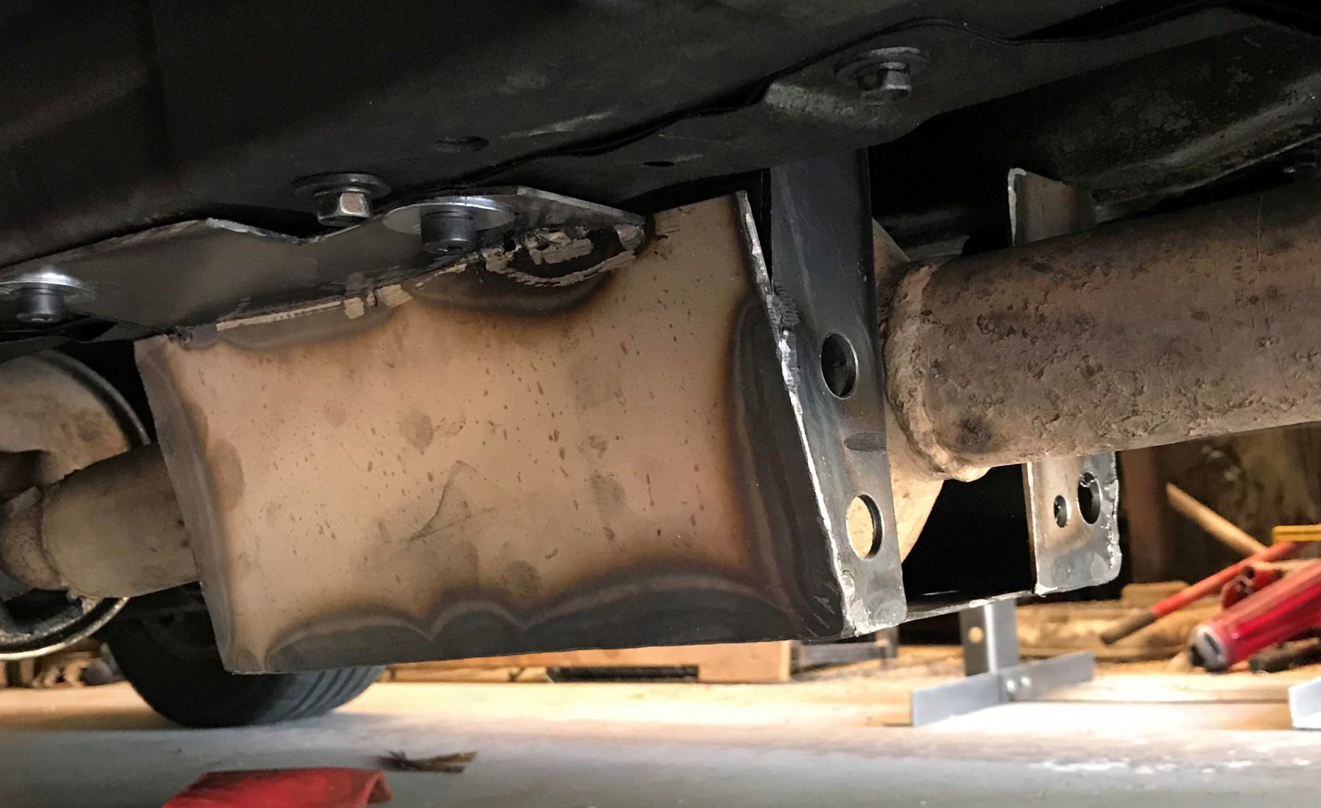 Just A Car Guy garage made catalytic converter security cage