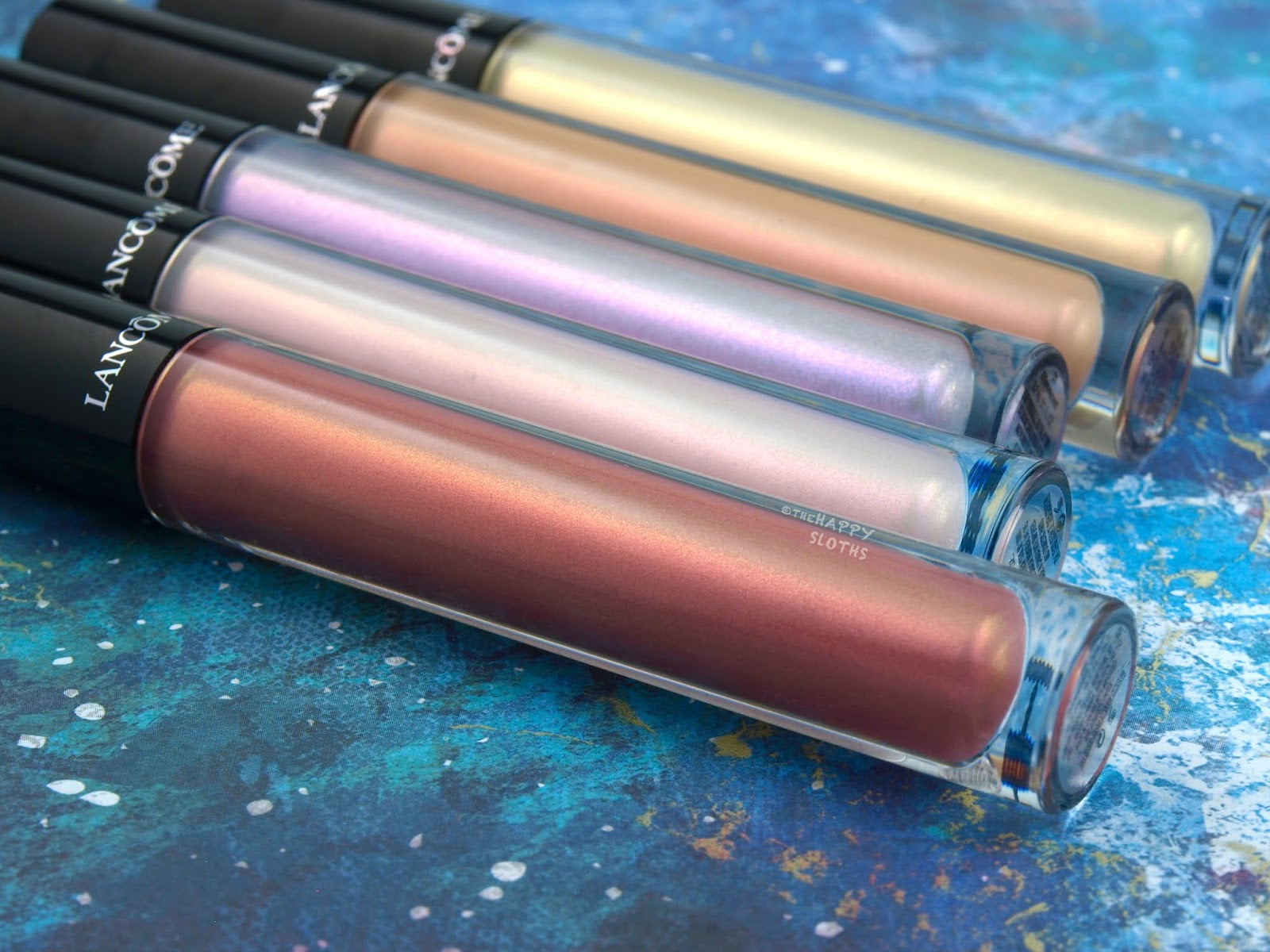 Prismatic Plump Lip Gloss Review and Swatches The Happy
