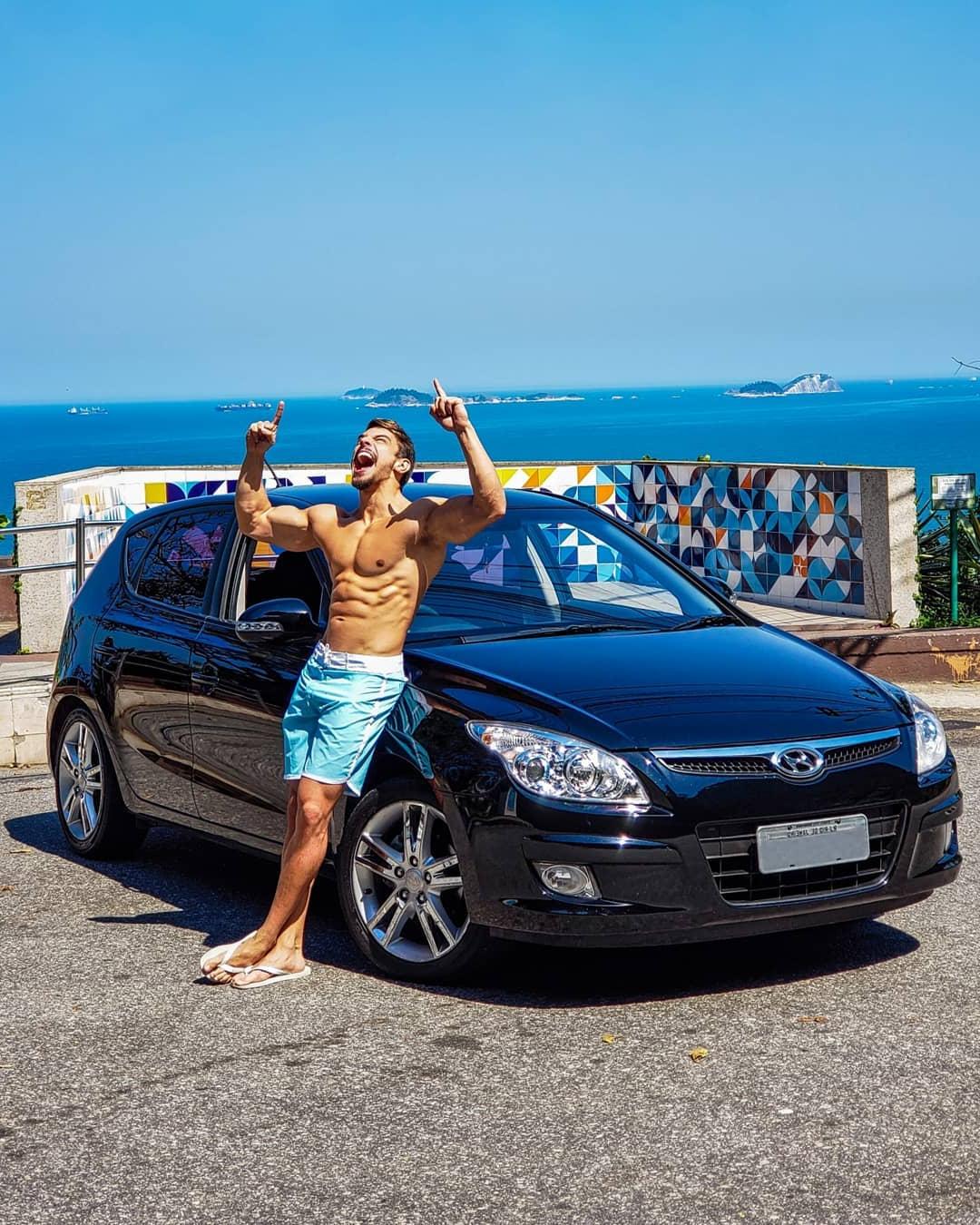 bare-chest-fit-guy-biceps-outdoor-vacation-car