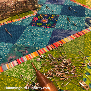 pin basting a quilt