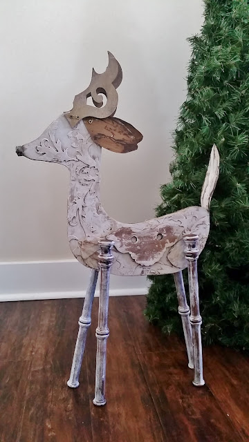wood reindeer sculpture