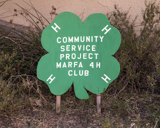 4-H clover sign: "Community Service Project Marfa 4-H Club"