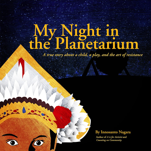 The cover of the book "My Night In The Planetarium" where a boy wearing a headdress, looks at the audience. In the background is a starry sky and a telescope.