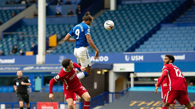 Everton forward Dominic Calvert-Lewin rose highest to beat Liverpool defenders