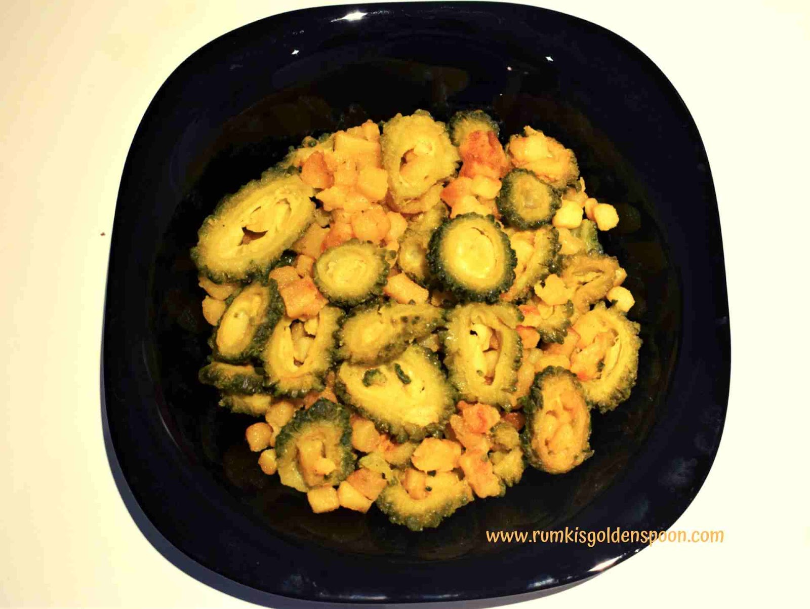 Bengali Style Aloo Korola Bhaja | Potato-Bitter Gourd fry Indian Recipe, Bengali Cuisine, Vegetarian recipe, vegan recipe, Quick and Easy, Rumki's Golden Spoon. Bengali Style Aloo Korola Bhaja | Potato-Bitter Gourd fry, Aloo karela bhaji, uchhe aloo bhaja, vegan dish with bitter gourd/karela/korola/uchhe, recipe with bitter gourd/karela/korola/uchhe